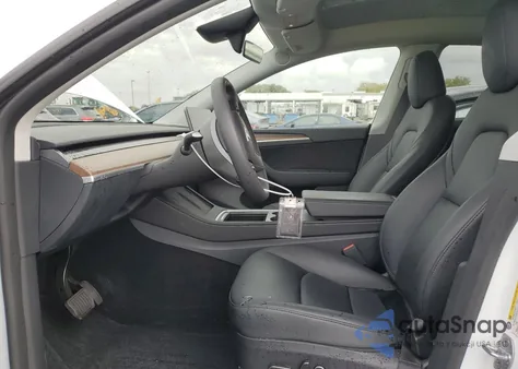 2024 Tesla Model Y from USA, damaged, VIN 7SAYGDED7RF184503